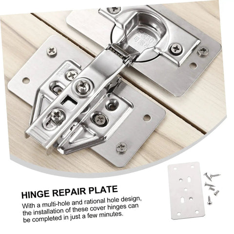 Close-up of Six Piece Cabinet Hinge Repair Plates Kit With Screws Durable Furniture Fixing Plates installed on wood surface.