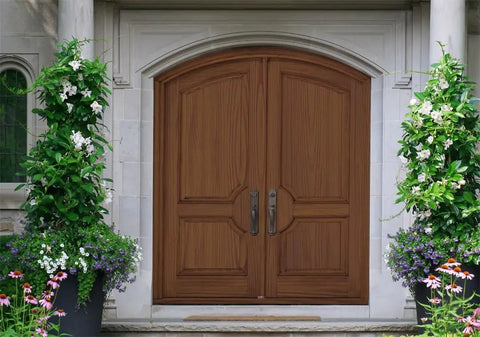 Smooth Operator Liquid Wood Gel Stain transforms front double doors into deep dark oak finish with beautiful potted plants.