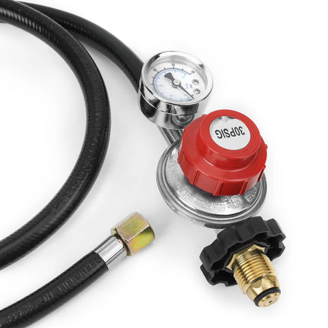 Propane regulator with gauge and red 30 PSI knob, attached to hose and POL fitting (close-up view).