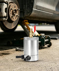 Ditch The Gunk And Keep Your Engine Sleek With This Rock Solid 300Ml Oil Catch Can Kit on garage floor with tools.