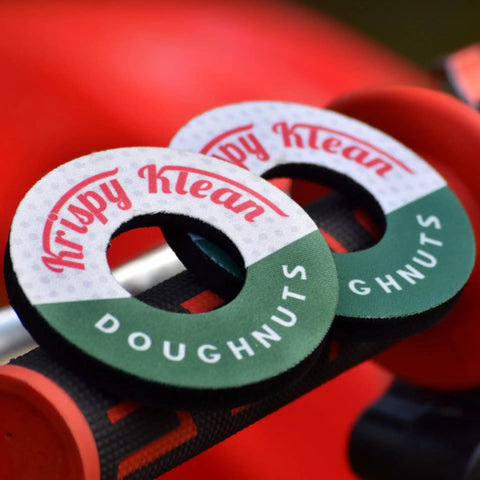 MX Grip Donuts For Dirt Bikes, Motorcycles, And BMX Cushioned Hand Grip Spacers With 7mm Thickness stacked on handlebars