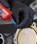 Applying Medium Strength Surface Insensitive Threadlocker For 1/4 To 3/4 Inch Fasteners on a screw in automotive use