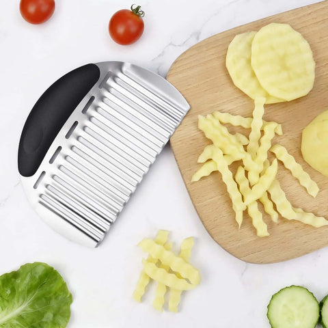 Side view of stainless steel potato crinkle cutter with black handle; large wavy fry cutter for potatoes and vegetables.