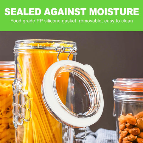 Eight Pack Silicone Canning Jar Seals With Airtight Reusable Gaskets Crafted For Standard Mouth Mason Lids To Keep Your Pantry Staples Locked Tight While Maintaining Peak Freshness Season After Season In White, showing silicone gasket on jar.