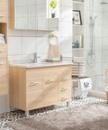 Modern bathroom with wooden cabinets, vanity, and open shower next to a tiled wall with a Gold Crystal Bathroom Accessories 4 Piece Set.