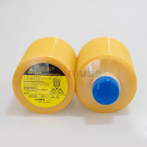 MY2-7 Cartridge Grease 700cc for Sumitomo injection molding machines, close-up of cartridge showing label and cap