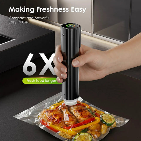 Portable Handheld Vacuum Sealer With LED Pressure Display sealing food in a bag, showing compact design and easy use