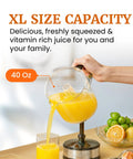 Elite Gourmet Citrus Juicer 1.2 L Capacity Black And Stainless Steel Electric Orange Lemon Squeezer pouring fresh juice into glass.