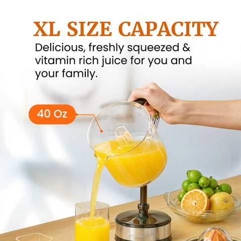 Elite Gourmet Citrus Juicer 1.2 L Capacity Black And Stainless Steel Electric Orange Lemon Squeezer pouring fresh juice into glass.