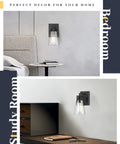 Two Light Wall Sconce In Brushed Nickel With Clear Glass Shades For Modern Vanity And Bathroom Lighting Sleek Wall Lamp For Bathroom Mirror Easy Install And Durable Performance in bedroom and study room setting.