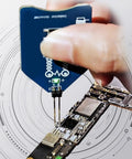 Using Go-To One Button Coil Tester For Motherboards And Power Supplies With Electromagnetic Induction Tech Inductor Detector For Quick Fault Diagnosis On PCBs Clear Green Light For Good Coils No Light For Faulty Inductors PCB Repair Tool on PCB.