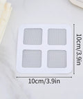 10 Piece Pack Disposable Shower Drain Catcher 3.9 Inch Silver Mesh Filter on a countertop, showing size and design for hair clogs.