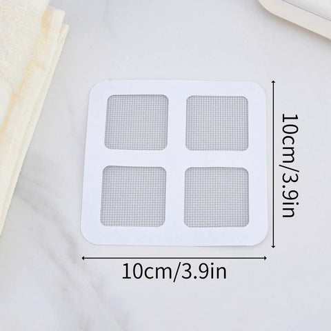 10 Piece Pack Disposable Shower Drain Catcher 3.9 Inch Silver Mesh Filter on a countertop, showing size and design for hair clogs.