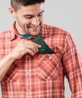 Man inserts 10 Piece Mini Needle File Set With Diamond And Steel Files In Synthetic Leather Case into shirt pocket
