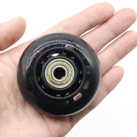 64mm Inline Skate Wheels 82A Polyurethane With ABEC-7 Bearings, 8 Pack Replacement Wheels For Roller Blades, Office Chairs, And Luggage - Built To Roll, Durable 24mm Wide, Fits Most Inline Skates shown in hand