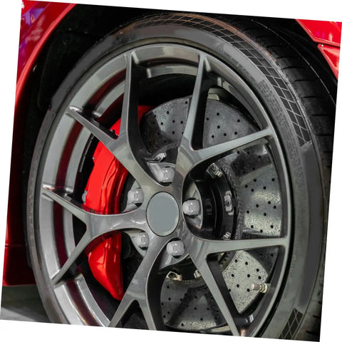 Alloy Wheel Lug Nut Screws For ATV Go Kart And Outdoor Racing No Hassle Install Wheel Fasteners on a sleek red alloy wheel