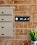 Durable Navy Blue And White First Aid Kit Sign Small 10 Pack With Heavy Duty Adhesive Foam Tape On Brick Wall