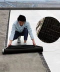 Self Healing Butyl Roofing Seal Tape With Reflective Aluminum Foil Backing For Waterproof Gutter Window And Shingle Jobs Heavy Duty Grip Tough As Nails Odorless being applied on a roof surface.