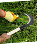 Person using Grass Scythe With Manganese Steel Blade And Long Handle For Easy Weeding And Lawn Care, cutting grass