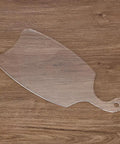 Slick Acrylic Charcuterie Board Router Template For Woodworking Cutting Board Stencil With Recessed Handle and curved patterns on wooden surface.