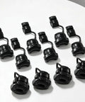 Heavy Duty Black Nylon Strain Relief Cord Connectors 6N 4 Model fits 0.3 inch round wire, pack of ten, organized on a white surface.