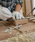 Pack Of Ten Heavy Duty Galvanized Steel Countertop Joint Connector Bolts on wooden work surface during installation.