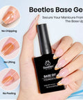 Hand holding base gel bottle from 4-Piece Gel Nail Kit With Base Coat, Top Coat, Dehydrator And Primer For Acrylic And Gel Polishes