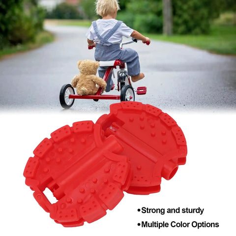 Two Pack Small Bike Pedals For Kids And Tricycles Red Plastic Front Wheel Foot Pedal Accessories Replacement For Mini Bicycles Measuring 6.8 By 6.5 Cm shown with a child riding a tricycle.