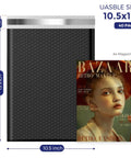 Black bubble mailer 10.5x15 inch next to A4 magazine, highlighting size and usage. 10 Point 5X16 Inch Bubble Mailers 40 Pack Self Seal Padded Envelopes Waterproof Cushioning Mailers Packaging Small Biz Ecommerce Shoppers Black Heavy Duty Protection.