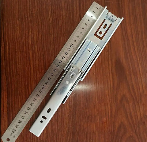 Pro Level Heavy Duty Full Extension Drawer Slides Six Inch Telescopic Ball Bearing Cabinet Rails with ruler for scale.