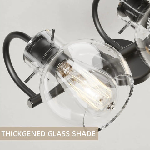 Close-up of Black Vanity Light 3 Light Modern Bathroom Fixtures Over Mirror With Globe Glass Shade Matte Black Finish E26 Base
