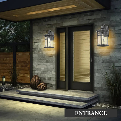 Large Outdoor Porch Light Wall Mount 15 Inch Sconce With Seeded Glass, black aluminum, illuminating a modern doorway.