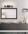 Dakota 5 Piece All In One Bathroom Set Includes Three Light Vanity Fixture With Seeded Glass Shades in matte black above dual sinks