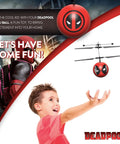 Child playing with World Tech Toys Deadpool Motion Sensing Flying Ball And Helicopter Toy Hands Free Control