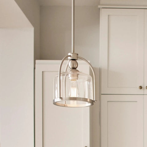 One Light Mini Pendant In Brushed Nickel, Cool Modern Steel Fixture for Kitchen Islands, shown with glass shade in kitchen setting