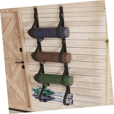 Heavy Duty Adjustable Wall Storage Straps For Garage Organization Rock Solid Wall Mount System showing three color-coded straps holding items.