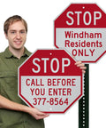 Tough As Nails Custom Stop Sign 18 X 18 Inches with vivid red lettering displayed outdoors by a person.