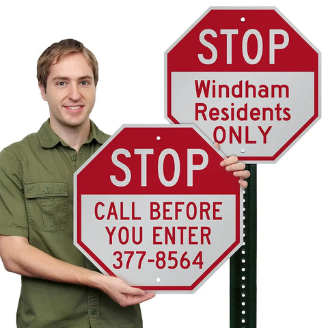 Tough As Nails Custom Stop Sign 18 X 18 Inches with vivid red lettering displayed outdoors by a person.