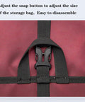 Close-up of black snap button on Climbing Quickdraw Hanging Storage Bag With Carabiner Hook Organizer, red 420D waterproof nylon material