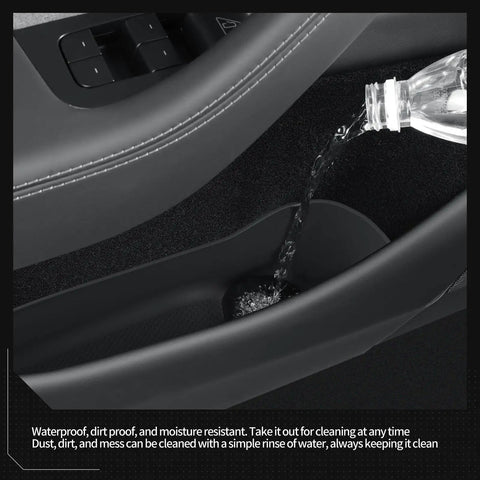Water pouring into Tesla Model Y Juniper 2025 2026 door pocket, demonstrating water resistance of 4 Piece Door Side Storage Organizer Set.