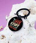 Keychain Gift For Men I Fix Stuff And I Know Things Ideal Dad Gift with black round keychain and mini tools on rock surface