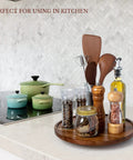12 Inch Wooden Lazy Susan Organizer With Smooth 360 Spin, Nifty Tabletop Turntable For Spices And Napkins on kitchen counter.