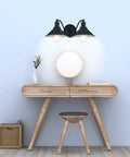 Two Light Vanity Wall Sconce In Oil Rubbed Black Finish above wooden vanity desk