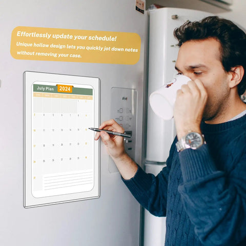 Man using Ten Pack Magnetic Sign Holders 8.5 By 11 Inch Clear Plastic Sign Holder on fridge to display calendar.
