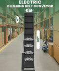 Front view of Climbing Belt Conveyor 39 Inch PVC Belt System With 4 Inch Spaced Baffles And Stepless Speed Control in a factory setting