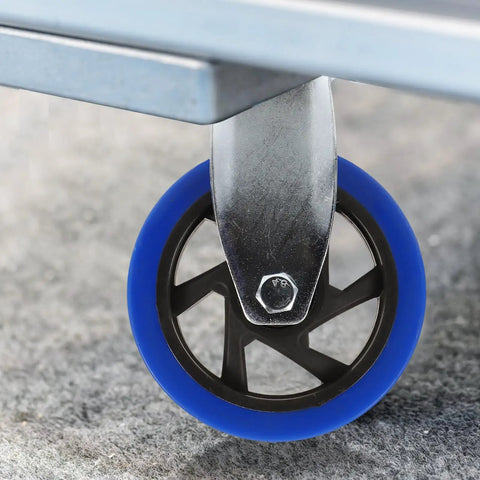 Hassle Free Heavy Duty Directional Plate Casters Featuring 5 Inch Black Rubber Wheels And Silent Non Swivel Design For Dead Simple Rolling On Trolleys Workbenches And Shop Carts, close-up of blue rubber wheel.