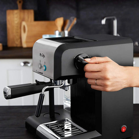 Your New Favorite Hustle Free Automatic Espresso And Cappuccino Maker Featuring Boss Level 15 Bar Pressure And Thermal Heating For Truly On Point Lattes In Silver And Black, close-up of control knob being adjusted.