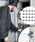 Chef adjusting shelves with 20 Pcs Industrial Freezer Shelf Clips Reinforced for Commercial Refrigerators and Walk-In Freezers Durable Shelf Stabilizers for Restaurants and Home Kitchens Easy Fit Rock-Solid Hold and Long-Lasting Storage Solution in a commercial fridge, close-up of clip detail.