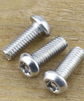 Badass M6 Security Torx Button Head Machine Screws 30 Pack Kit With Included T30 Driver Bit Made From Slick 304 Stainless Steel 18-8 Tamper Resistant Full Thread No Sweat screws on wood background.