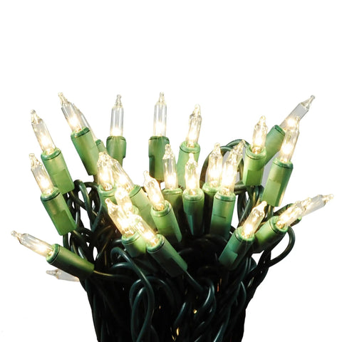 Make Your Holiday Lit With A 35 Count Clear Extra Bright Mini Christmas Lights Set, Eight And A Half Foot Length, Indoor Outdoor Use, Connect Up To 10 Sets, Includes 4 Spare Bulbs And 1 Spare Fuse For Easy Decorating And Winter Cheer, close-up view.